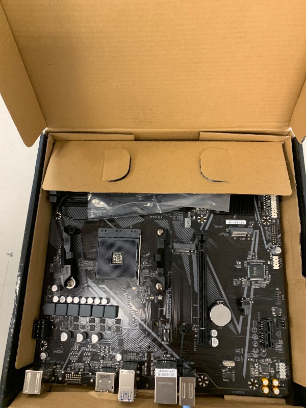 Photo 1 of GIGABYTE B550M K Motherboard, Supports AMD AM4 Ryzen 5000 Processors, Micro-ATX, DDR4, Dual M.2, SATA 6Gb/s, Realtek GbE LAN, PCIe 4.0