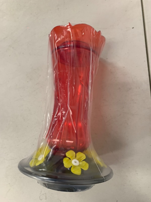 Photo 1 of Jealoeur Hummingbird Feeder for Outdoors Hanging, 18 OZ Humming Birds Feeders with 6 Bee Guard Feeding Ports & Built-in Ant Moat, Easy to Clean, Durable Outdoor Garden Decor, Red