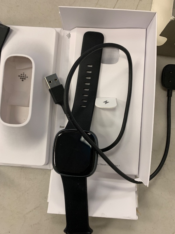 Photo 1 of Fitbit Versa 4 Fitness Smartwatch with Daily Readiness, GPS, 24/7 Heart Rate, 40+ Exercise Modes, Sleep Tracking and more, Black/Graphite, One Size (S & L Bands Included)