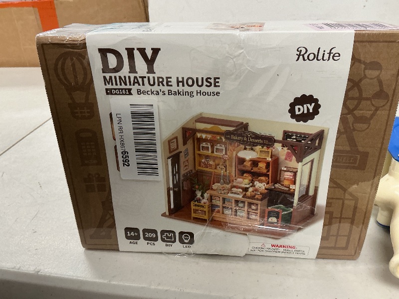 Photo 1 of Rolife DIY Miniature Doll House Kit, Build Becka's Bakery Diorama House Building Set with LED Room Hobby Craft for Aduls Uniue Gifts for Teens