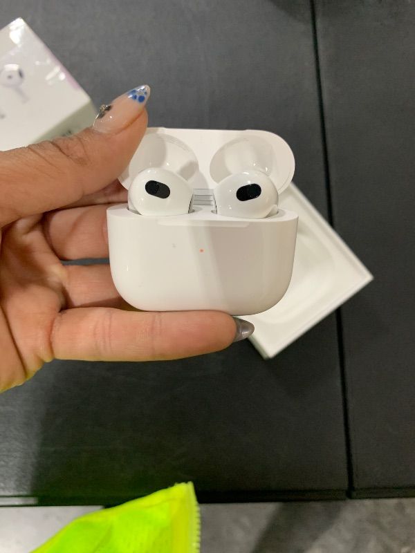 Photo 4 of Apple AirPods 4 Wireless Earbuds, Bluetooth Headphones, Personalized Spatial Audio, Sweat and Water Resistant, USB-C Charging Case, H2 Chip, Up to 30 Hours of Battery Life, Effortless Setup for iPhone