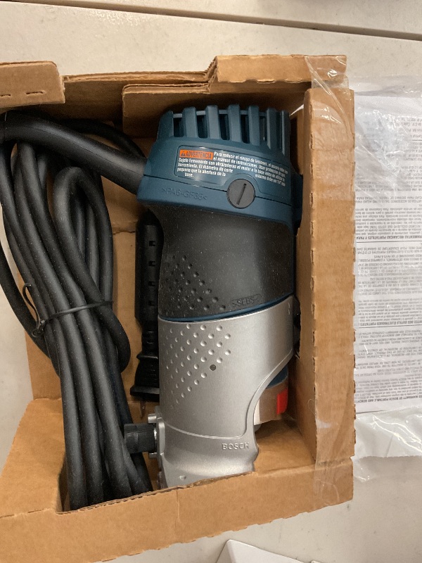Photo 1 of BOSCH PR20EVSNK Colt Installers Kit 5.7 Amp 1 Hp Fixed-Base Variable-Speed Router with 3 Assorted Bases and Edge Guide