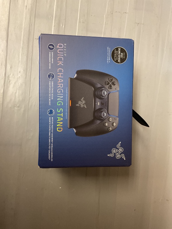 Photo 1 of Razer Quick Charging Stand for PlayStation 5: - Curved Cradle Design - Matches PS5 DualSense Wireless Controller - One-Handed Navigation - USB Powered - Black (Controller Sold Separately)