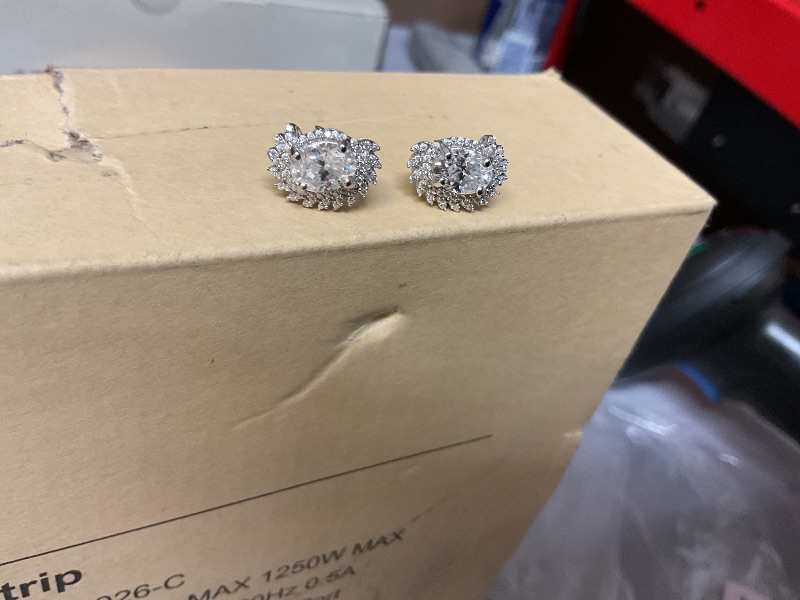 Photo 1 of Sterling Silver & Round and Oval Cut White Cubic Zirconia 2/3" Halo Scalloped Oval Shape Floral Stud Earrings