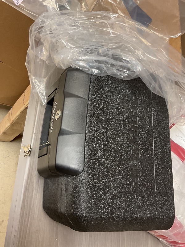 Photo 1 of SEE NOTES PICTURES…………SentrySafe Fireproof Money Safe with Key Lock, Black Lock Box with Portable Carrying Handle for Travel, Exterior: 14.3 in. W x 11.2 in. D x 6.1 in H, 1200