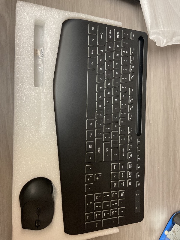 Photo 1 of Wireless Keyboard and Mouse Combo- 7-Color Backlit, Wrist Rest, Rechargeable, Silent Light-Up Keys, RGB Mouse, Ergonomic Full Size Keyboard with Phone Holder for Windows, Mac, PC, Laptop - Trueque