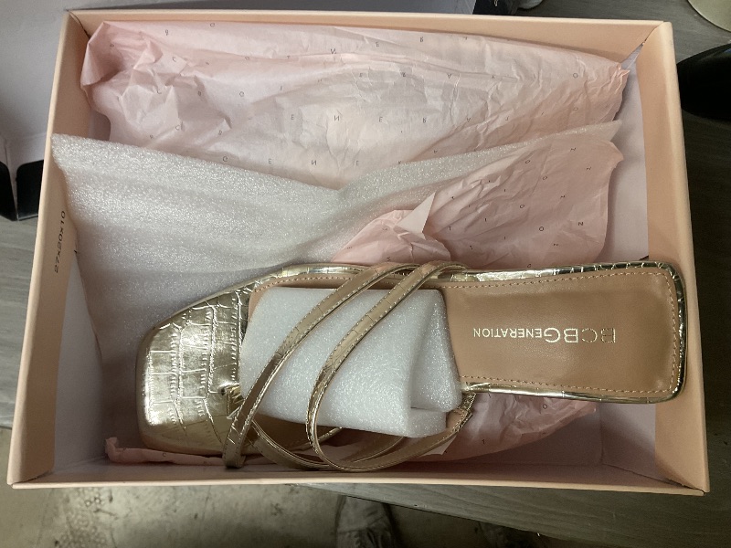 Photo 1 of BCBGeneration Women's MOSINA Heeled Sandal, Platino Snake, 9.5