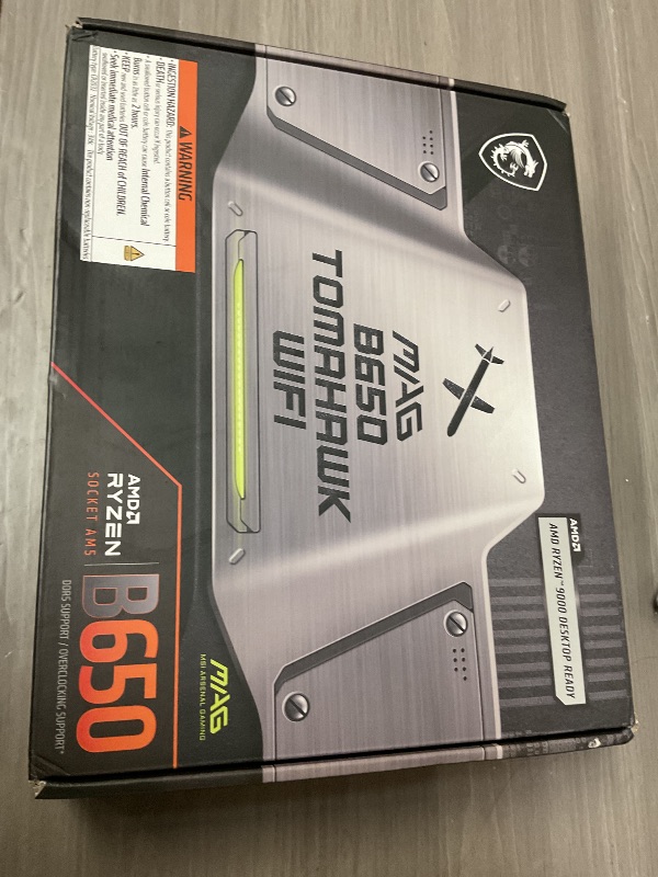 Photo 1 of MSI MAG B650 Tomahawk WiFi Gaming Motherboard (AMD Ryzen 9000/8000/7000 Series Processors, AM5, DDR5, PCIe 4.0, M.2, SATA 6Gb/s, USB 3.2 Gen 2, HDMI/DP, Wi-Fi 6E, Bluetooth 5.3, 2.5Gbps LAN, ATX)