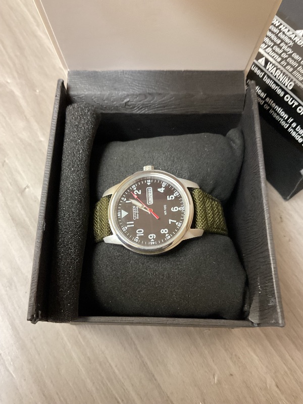 Photo 1 of Citizen Men's Eco-Drive Weekender Garrison Field Watch in Stainless Steel with Olive Nylon strap, Black Dial (Model: BM8180-03E)