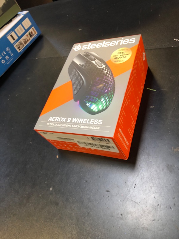 Photo 1 of SteelSeries Aerox 9 Wireless - Holey RGB Gaming Mouse - Ultra-lightweight Water Resistant Design - 18 Buttons – Bluetooth/2.4 GHz - 18K DPI TrueMove Air Optical Sensor