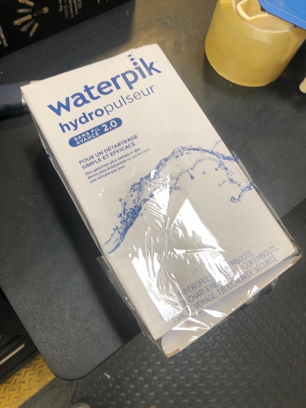 Photo 2 of Waterpik Cordless Advanced 2.0 Water Flosser For Teeth, Gums, Braces, Dental Care With Travel Bag and 4 Tips, ADA Accepted, Rechargeable, Portable, and Waterproof, Gray WP-587, Packaging May Vary