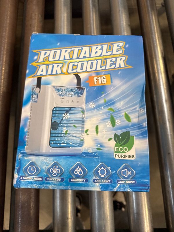 Photo 1 of Portable Air Conditioner, 4 in 1 Mini Air Conditioner with 650ml Water Tank, Portable Air Cooler with 3 Speeds & 7 LED Lights, Personal Desktop Cooling Fan for Car Home Camping Room
