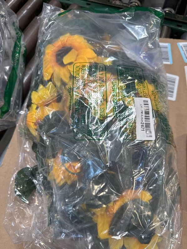 Photo 1 of BLEUM CADE 4 Pack 30Ft Artificial Sunflower Garland Vines with 3D Butterfly, Fake Sunflowers Decor for Wedding Baby Shower Birthday Party Decorations, Yellow Flower Garland for Kitchen Bathroom Decor