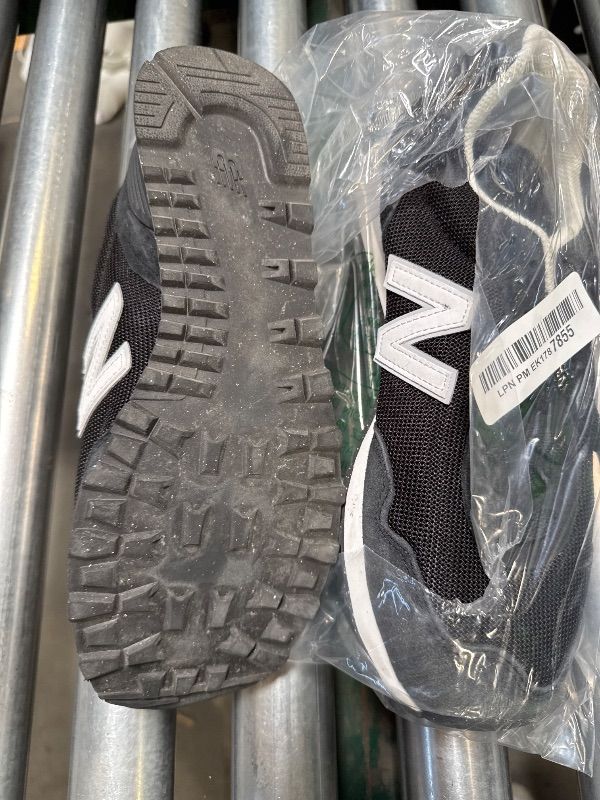 Photo 1 of New Balance Women's 515 V3 Sneaker, Black/White/Aluminum Grey, 10