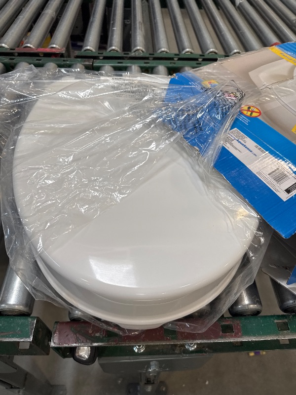 Photo 1 of Drive Medical 770-626 AquaSense Raised Toilet Seat with Lid, Standard Seat, White
