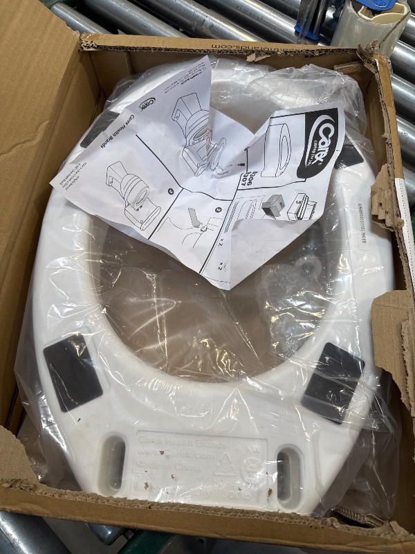 Photo 1 of Carex Toilet Seat Riser, Elongated Raised Toilet Seat Adds 3.5 inches to Toilet Height, for Assistance Bending or Sitting, 300 Pound Weight Capacity Toilet Riser