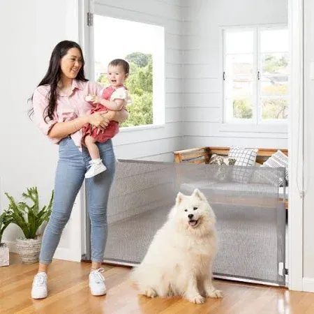 Photo 1 of  Child Safety Retractable Baby Gate
