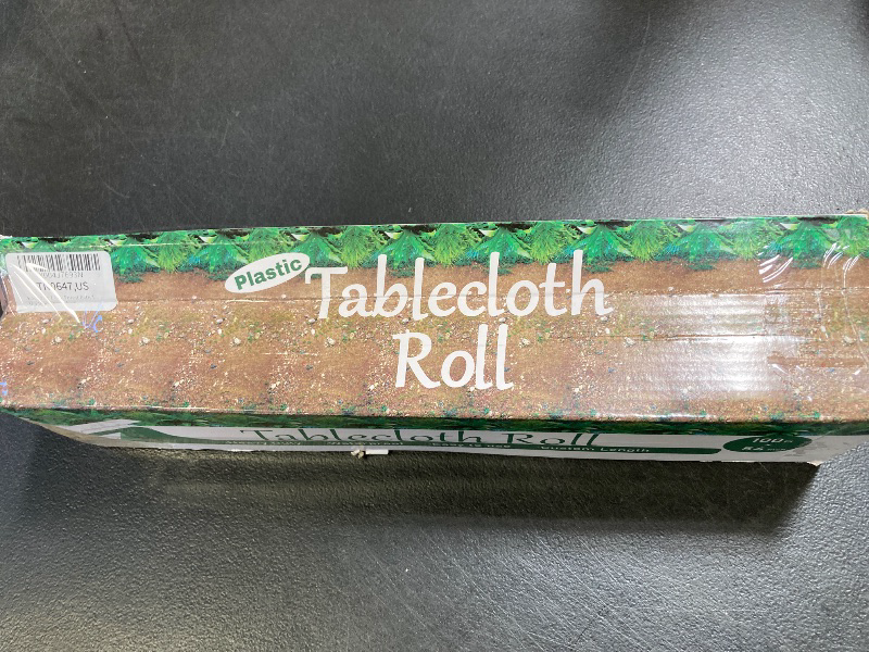 Photo 1 of Kochorie 1 Roll Forest Path Plastic Tablecloth Roll 100 Ft x 54 Inch Safari Dinosaur Jungle Table Cover with Cutter Box for Birthday Baby Shower Party Supplies