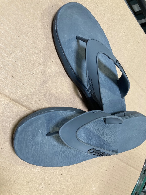 Photo 1 of  oakley men sandals flip flop size 10
