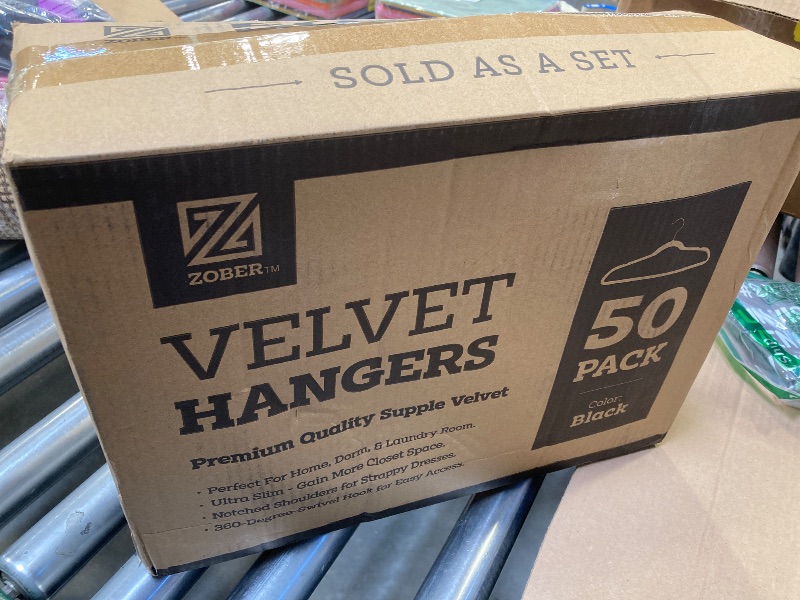 Photo 1 of Zober Velvet Hangers 50 Pack - Black for Coats, Pants & Dress Clothes - Non Slip w/ 360 Degree Swivel, Holds up to 10 lbs - Strong Felt Hangers for Clothing