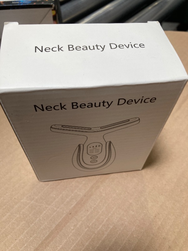Photo 1 of Neck Face Massager, 7-in-1 Portable Facial Massager for Enhanced Face, Neck and Shoulder Care with Vibrating and Warming Function?White