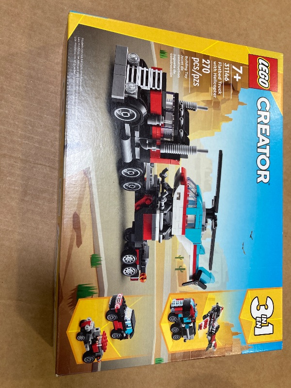 Photo 1 of LEGO Creator 3 in 1 Flatbed Truck with Helicopter Toy, Transforms from Flatbed Truck Toy to Propeller Plane to Hot Rod and SUV Car Toys, Gift Idea for Boys and Girls Ages 7 Years Old and Up, 31146