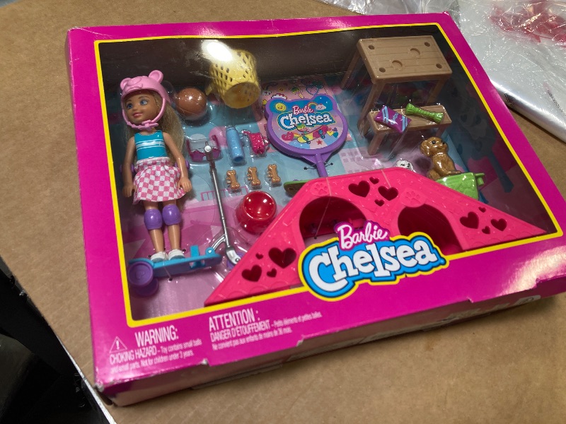 Photo 1 of Barbie Chelsea Doll & Skate Park Playset with 2 Puppies, Skate Ramp, Scooter & 15+ Accessories, Brunette Small Doll with Blue Eyes