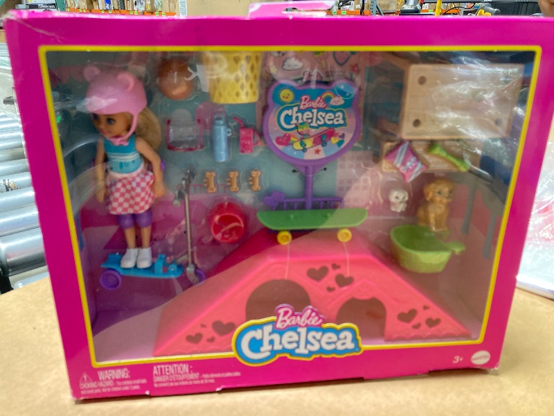 Photo 1 of Barbie Chelsea Doll & Skate Park Playset with 2 Puppies, Skate Ramp, Scooter & 15+ Accessories, Brunette Small Doll with Blue Eyes