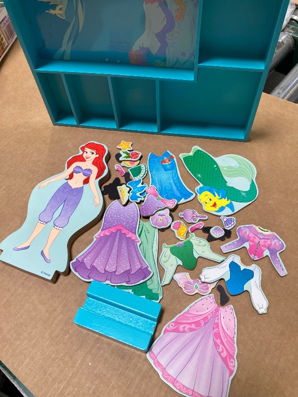 Photo 1 of Melissa & Doug Disney Ariel Magnetic Dress-Up Wooden Doll Pretend Play Set (30+ pcs)