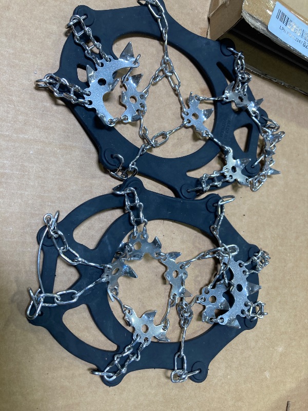 Photo 1 of Yaktrax Adventure Grip Crampons- Durable Winter Traction Device with Stainless Steel Spikes for Ice and Snow, Flexible Rubber Upper, Fits Various Footwear, Ideal for Hiking and Mountaineering