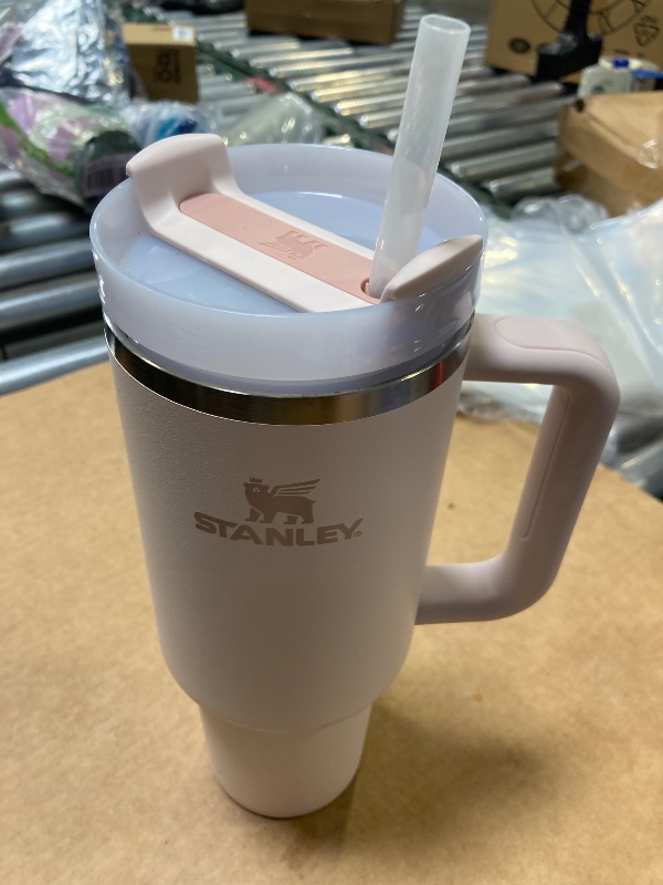 Photo 1 of Stanley Quencher H2.0 Tumbler with Handle and Straw 40 oz | Flowstate 3-Position Lid | Cup Holder Compatible for Travel | Insulated Stainless Steel Cup | BPA-Free | Rose Quartz 2.0