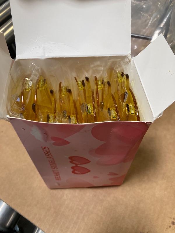 Photo 1 of LYMOJOR 12 Pairs Yellow Heart Sunglasses for Women, Candy Color Rimless Fun Heart Glasses for Women Party Favors