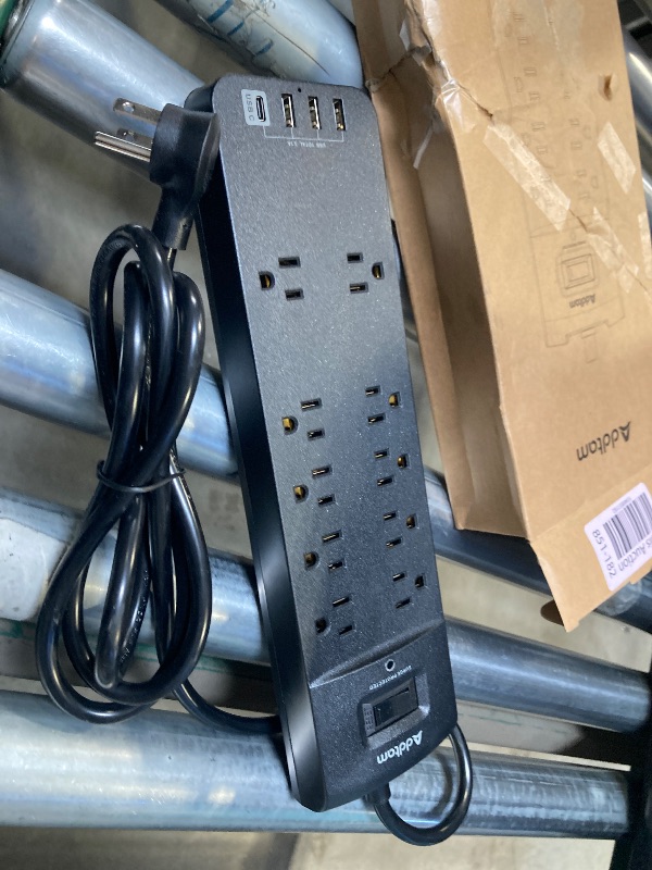 Photo 1 of Power Strip - Addtam Surge Protector with 10 Outlets and 4 USB Ports, 6 Feet Extension Cord with Flat Plug, 2700 Joules, ETL Listed, Black
