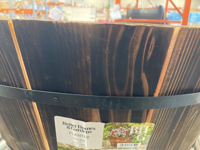 Photo 1 of Large Barrel Planter 