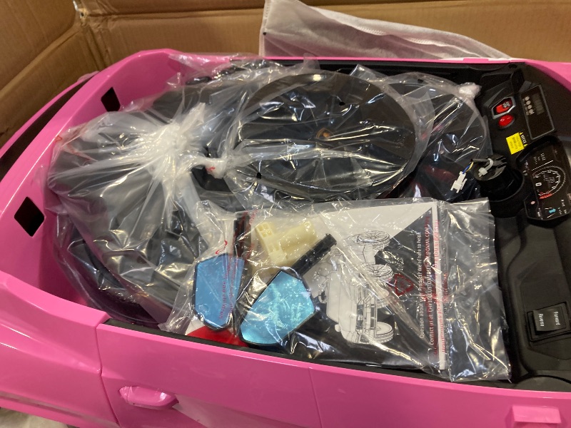 Photo 1 of Rock Wheels Licensed Lamborghini Urus Ride On Truck Car Toy, 12V Battery Powered Electric 4 Wheels Kids Toys w/Parent Remote Control, Foot Pedal, Music, Aux, LED Headlights, 2 Speeds (Pink)