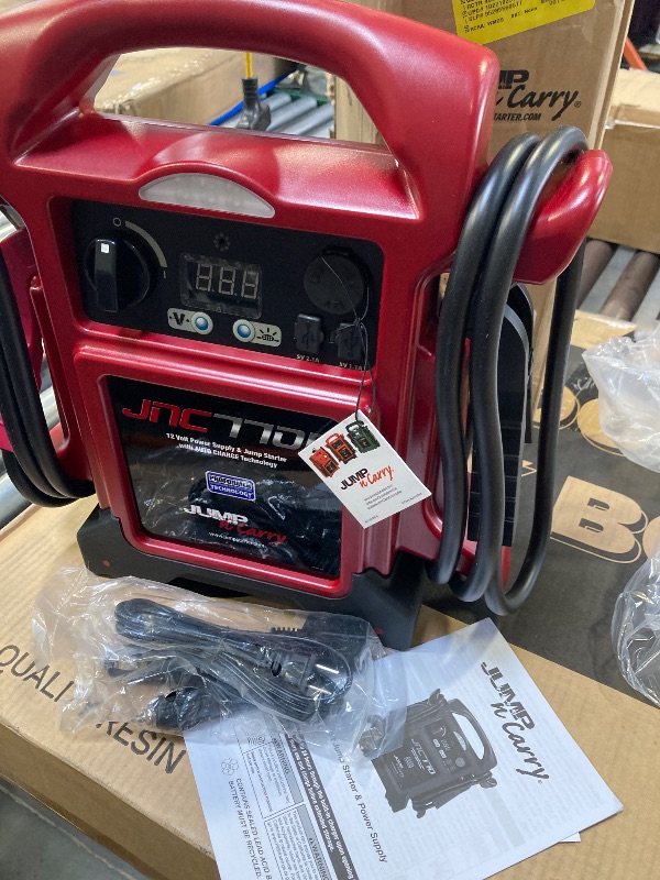 Photo 1 of Clore Automotive Jump-N-Carry JNC770R 1700 Peak Amp Premium 12 Volt Jump Starter - Red