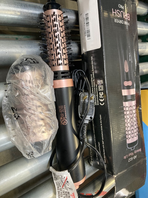 Photo 1 of ANWA Rotating Hair Dryer Brush Spinning, 4-in-1 Rotating Brush Hair Dryer for Women, Hot Air Styler with 2 Detachable Brushes(1.5"& 2")