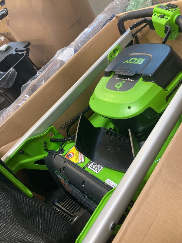 Photo 1 of USED---60V 21” Cordless (Self-Propelled) Lawn Mower . 2 x 4.0Ah Batteries and Dual Port Rapid Charger