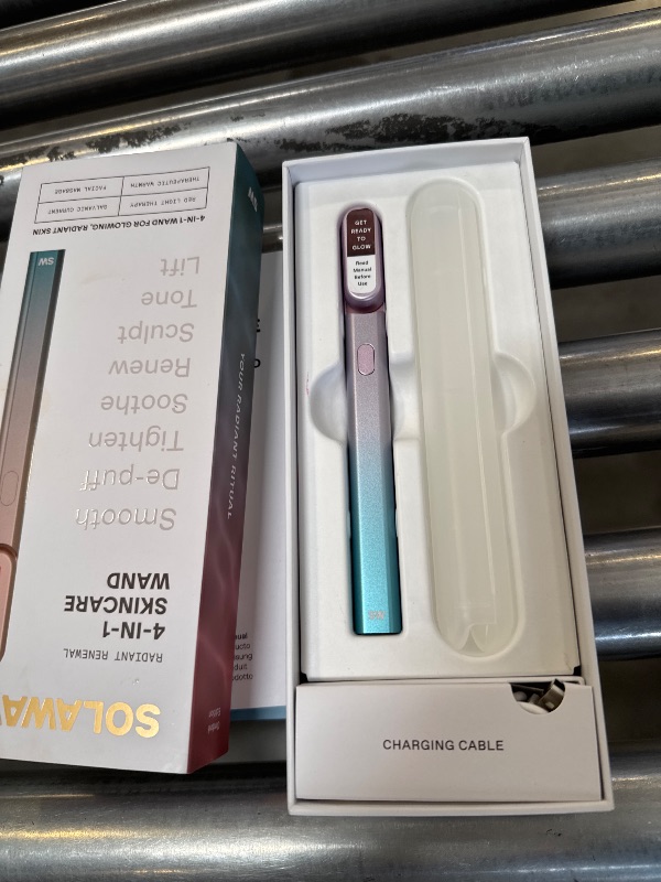 Photo 1 of Solawave 4-in-1 Skinware Wand - Upgraded Radiant Renewal with Facial Massager, Red Light, Galvanic Current, and Therapeutic Warmth Anti-Aging Beauty Device (Blue/Pink Ombre)