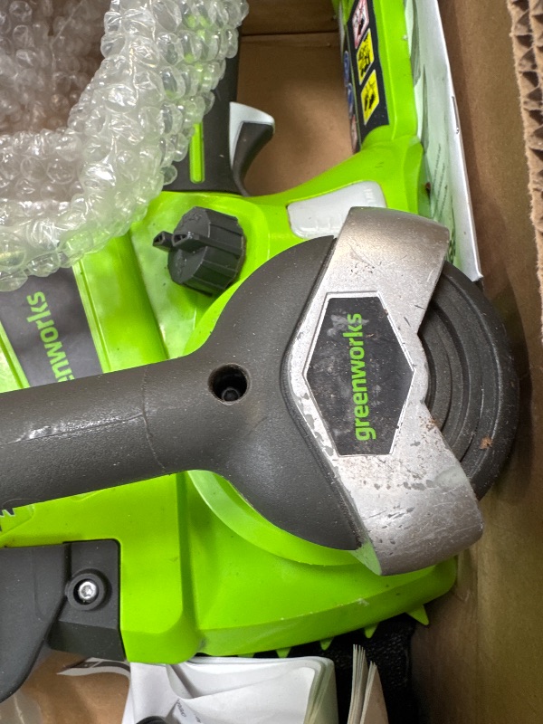 Photo 1 of Greenworks 24V 10" Cordless Chainsaw, 2.0Ah Battery and Charger Included