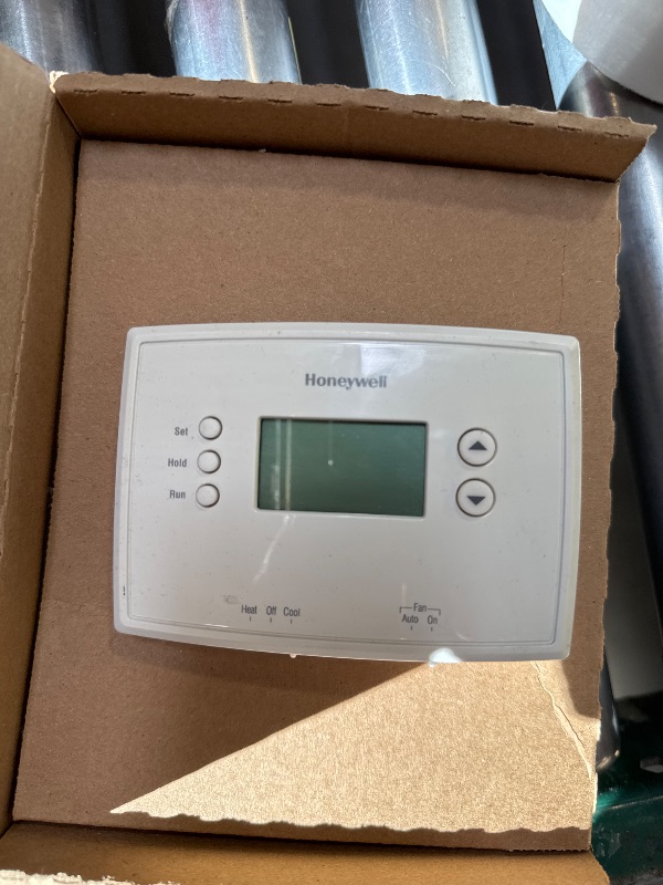 Photo 1 of Honeywell Home RTH2300B1038 5-2 Day Programmable Thermostat, White