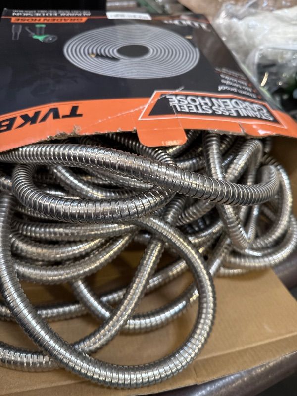 Photo 1 of TVKB Metal Garden Hose 100ft Stainless Steel Water Hose Super Tough Flexible Water Pipe with 3/4 inch Brass Fittings and Sprayer Nozzle, Kink & Tangle Free, Rust Proof