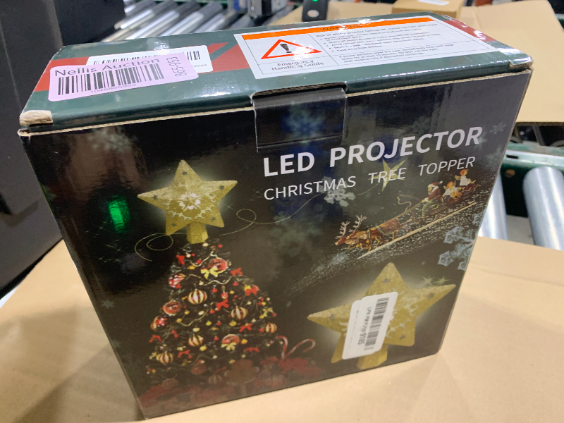 Photo 1 of Christmas Tree Topper Lighted with Built-in LED Rotating Snowflake Projector, 3D Hollow Glitter Silver Snowflake Tree Topper for Xmas Party Holiday Christmas Decorations