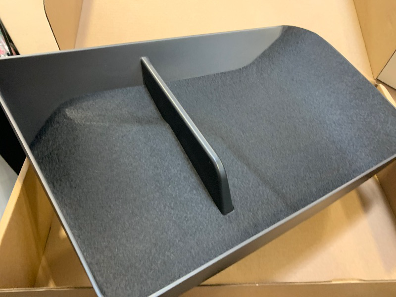 Photo 1 of  storage tray designed for Tesla Model 3 or Model Y vehicles. 
