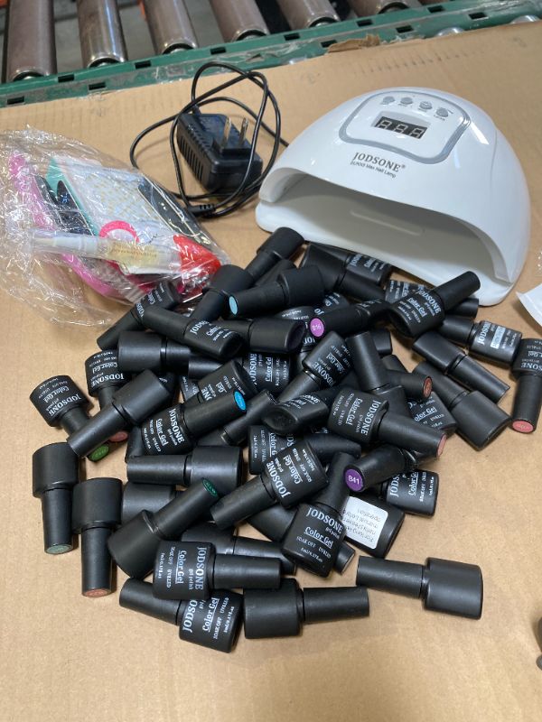 Photo 1 of JODSONE  Gel Nail Polish Kit with U V Light 55 Kinds of Gorgeous and Charming Gel Polish Kit 5 Pieces Soak off Glossy Matte Top Coat Base Coat
