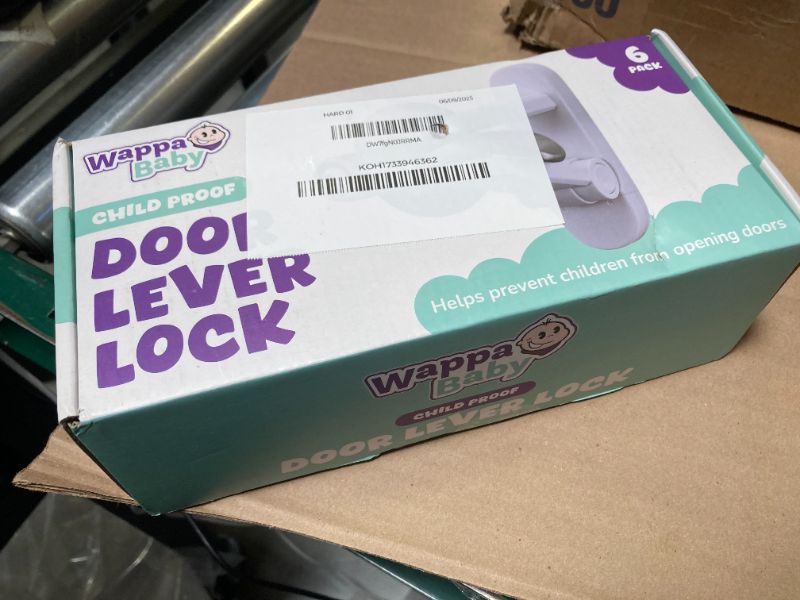 Photo 1 of Door Lever Lock (6 Pack) Prevents Toddlers from Opening Doors. 3.25" L * 1.5" W * 4.5" H Easy One Hand Operation for Adults. Durable ABS with 3M Adhesive Backing. Simple Install, No Tools Needed.