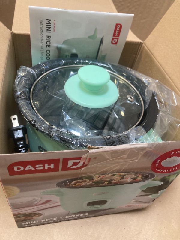 Photo 1 of DASH Mini Rice Cooker Steamer with Removable Nonstick Pot, Keep Warm Function & Recipe Guide, .5 Quart, for Soups, Stews, Grains & Oatmeal - Aqua