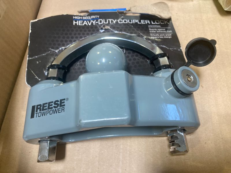 Photo 1 of Reese Towpower 7088300 Trailer Coupler Lock, Universal Fit, Heavy Duty, Designed to fit 1-7/8-in, 2-in, and 2-5/16-in couplers.