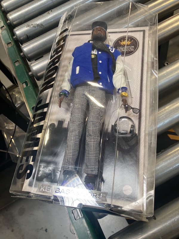 Photo 1 of Package is damage---Barbie Signature Lebron James Kenbassadors Doll Collectible with Varsity Bomber Jacket Outfit & Accessories Including Headphones, Sunglasses, & More