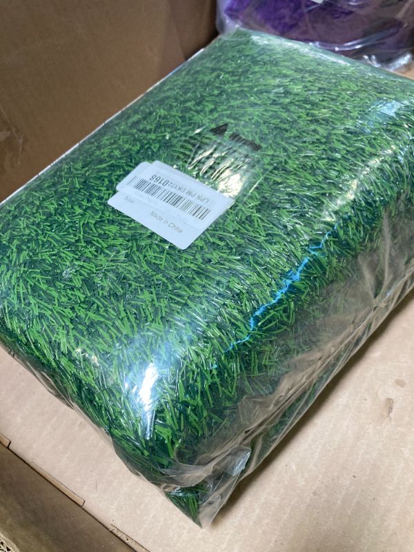 Photo 1 of Pad For Dogs 39.3 x 31.5 inches Strong Absorbency Soft Artificial Grass for Pets Potty Training, Easy to Clean Fake Grass for Dog Indoor Outdoor Use(1 Pack)